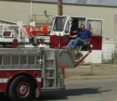 Wil got to ride in the tiller position of Fire House #2's special rig.  Going down the street at 45 mph sideways was a neat experience.
